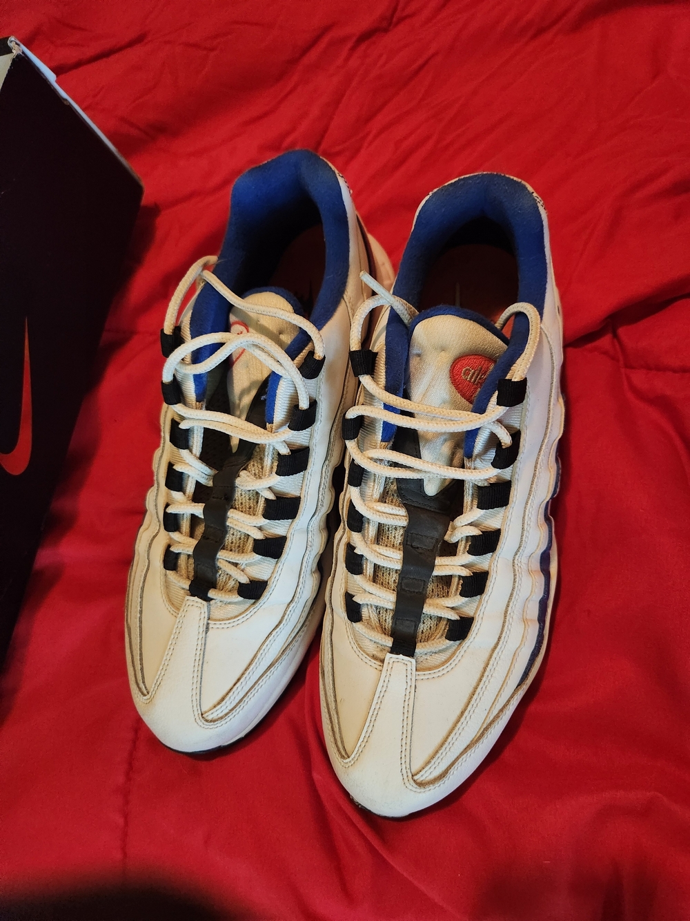 Nike White Athletic Sneakers with Blue Interior and Black Accents